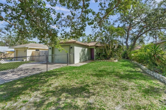 ranch-style house with a front yard and a garage