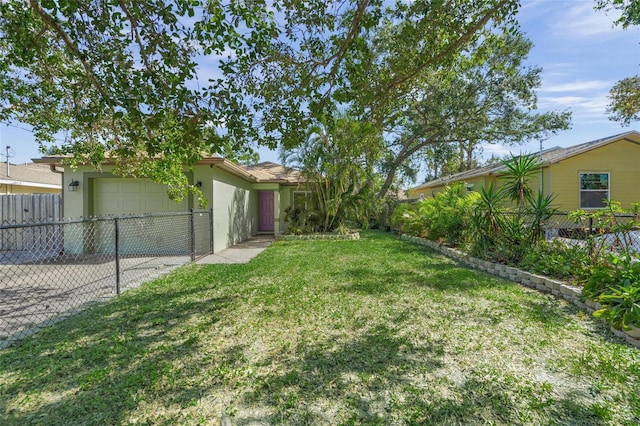 view of yard with a garage