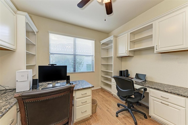 home office featuring ceiling fan and light hardwood / wood-style flooring