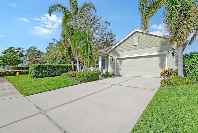 ranch-style home with a front yard and a garage