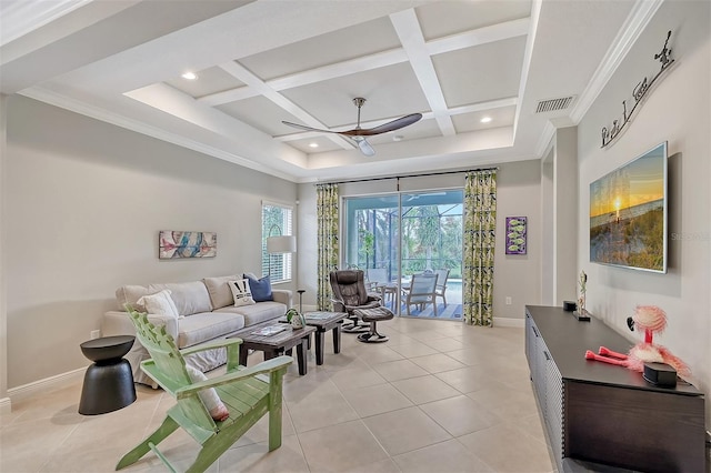 living room with ceiling fan, light tile patterned floors, coffered ceiling, and ornamental molding