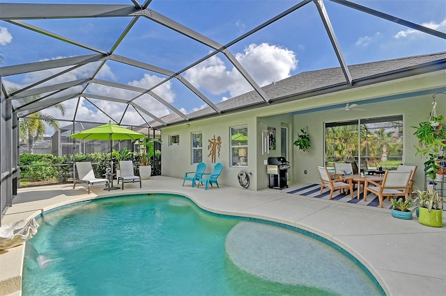 view of pool featuring a patio, pool water feature, area for grilling, and a lanai