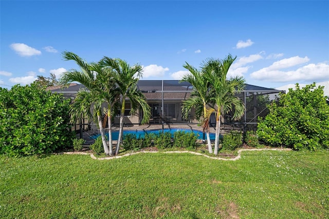 view of yard with a lanai