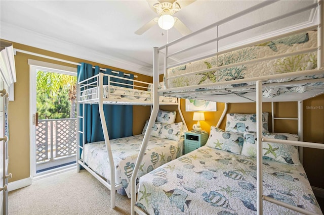 bedroom with carpet, ceiling fan, and crown molding