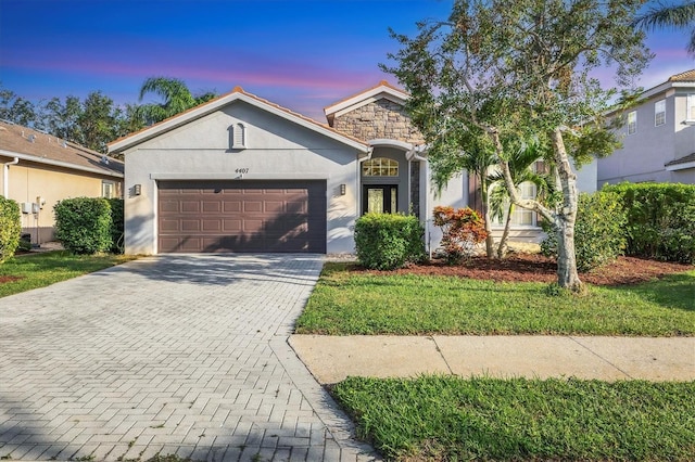 view of front of property featuring a garage