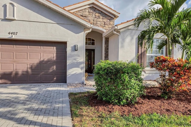 property entrance featuring a garage