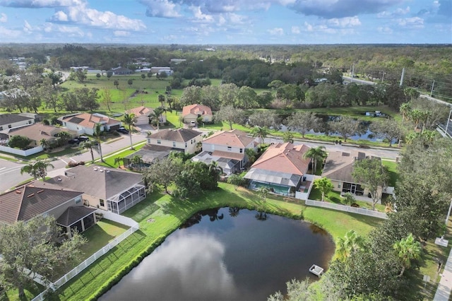 drone / aerial view with a water view