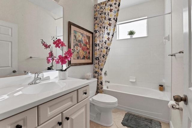 full bathroom featuring tile patterned floors, vanity, toilet, and shower / tub combo with curtain