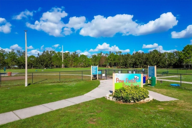 surrounding community featuring a yard