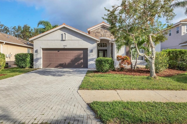 view of front of property featuring a garage