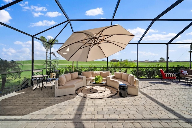 view of patio featuring a lanai and an outdoor hangout area