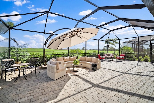 view of patio / terrace with glass enclosure and an outdoor hangout area