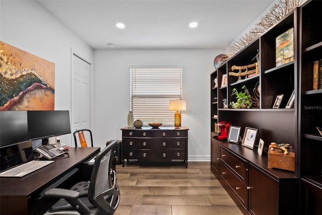 office area featuring light wood-type flooring