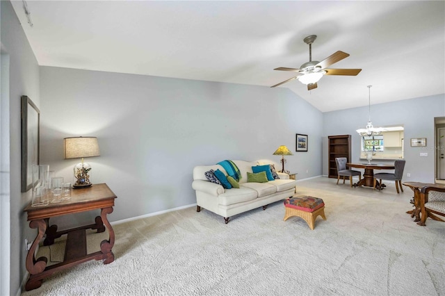 living room featuring ceiling fan, carpet, and lofted ceiling