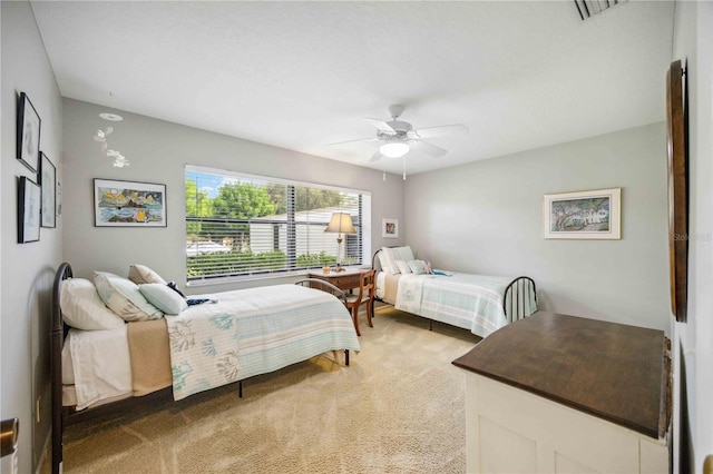 bedroom featuring carpet floors and ceiling fan