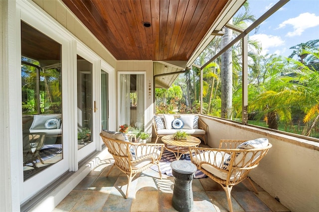 sunroom / solarium with a wealth of natural light