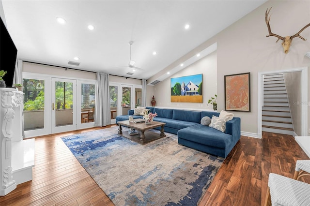 living room with ceiling fan, french doors, high vaulted ceiling, and hardwood / wood-style flooring