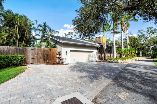 view of home's exterior with a garage