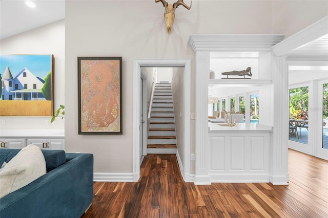 interior space featuring hardwood / wood-style floors and lofted ceiling