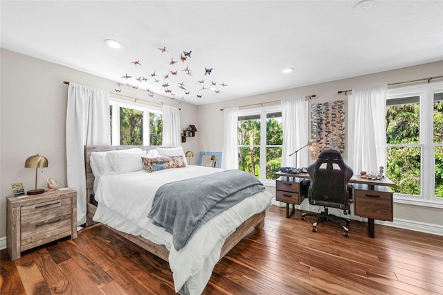 bedroom featuring dark hardwood / wood-style floors