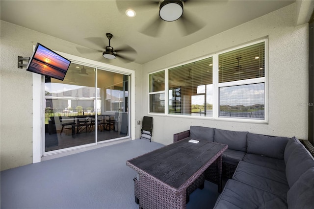 view of patio with an outdoor hangout area and ceiling fan