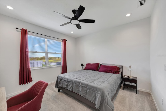 carpeted bedroom featuring ceiling fan