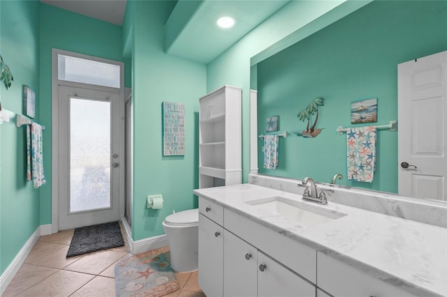 full bathroom with tile patterned floors, a shower stall, vanity, and toilet