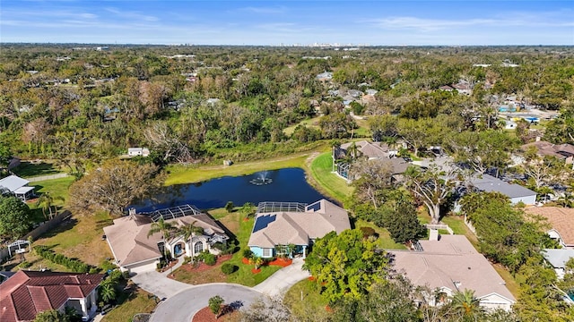 drone / aerial view with a residential view and a water view