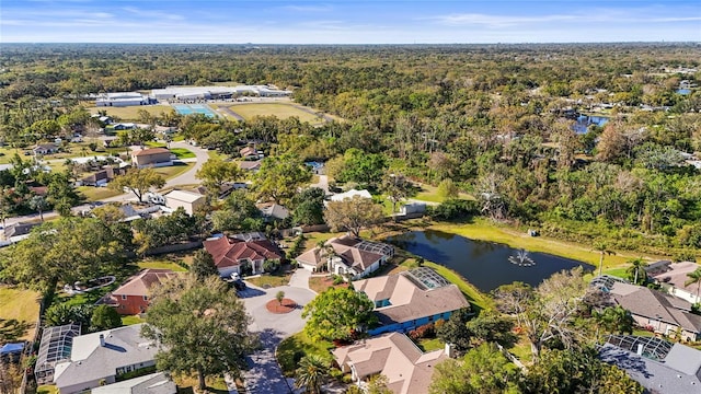 birds eye view of property with a water view and a residential view