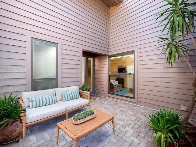 view of patio with an outdoor hangout area