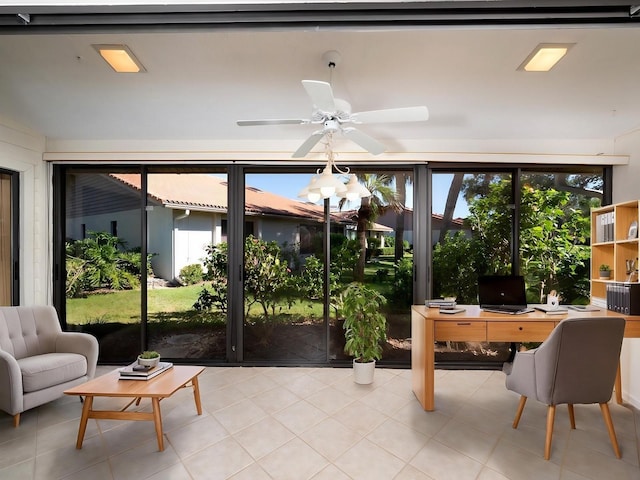 sunroom with ceiling fan