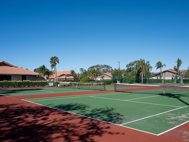 view of sport court with basketball hoop