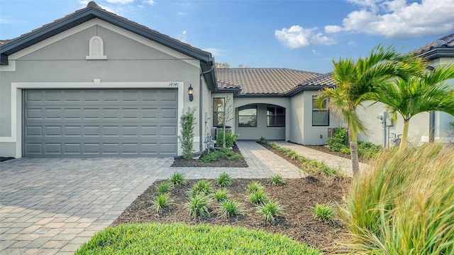 view of front of home with a garage