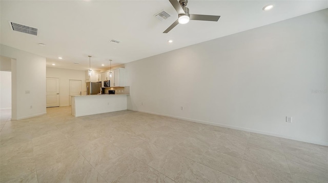 unfurnished living room featuring ceiling fan