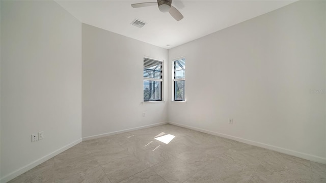 unfurnished room featuring ceiling fan