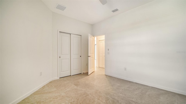 unfurnished bedroom with a closet