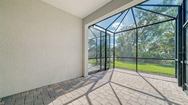 view of patio / terrace with a lanai