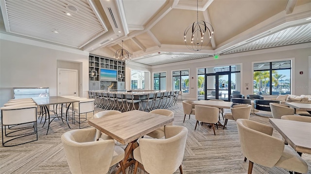 dining space with french doors, crown molding, beam ceiling, high vaulted ceiling, and a notable chandelier