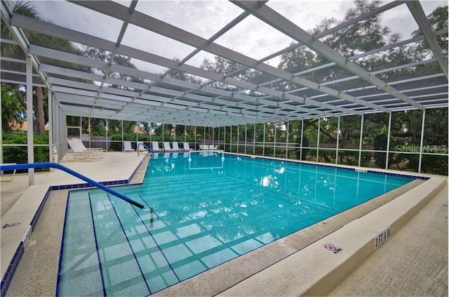 view of pool featuring a lanai and a patio area