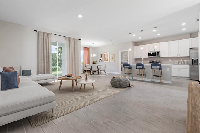 living room with light hardwood / wood-style floors