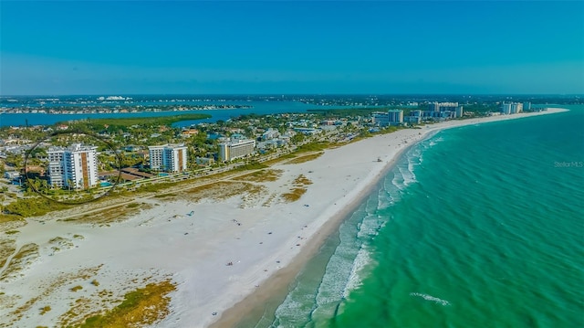 drone / aerial view with a view of the beach and a water view