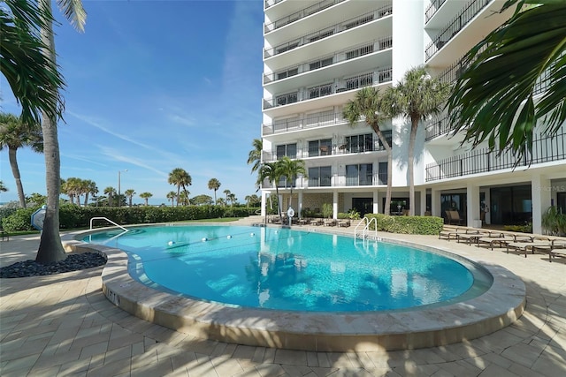 view of pool with a patio