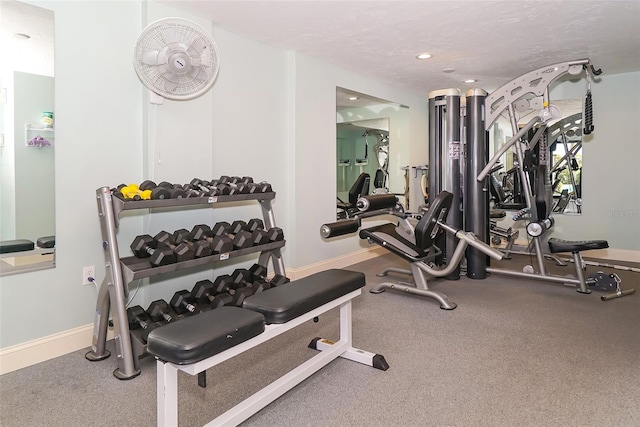 workout area with a textured ceiling