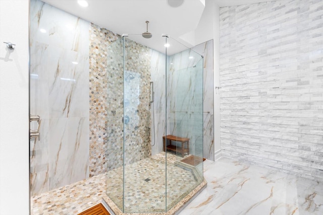 bathroom featuring tiled shower