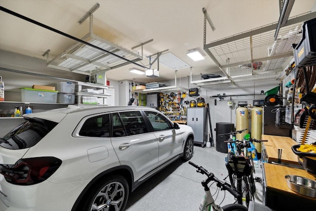 garage featuring a garage door opener