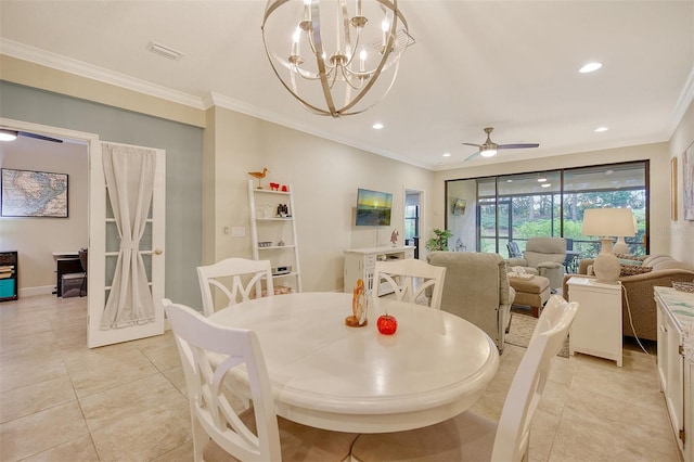 dining area featuring light tile patterned floors, ceiling fan with notable chandelier, and ornamental molding