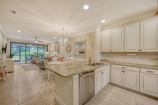 kitchen with decorative backsplash, kitchen peninsula, sink, dishwasher, and hanging light fixtures