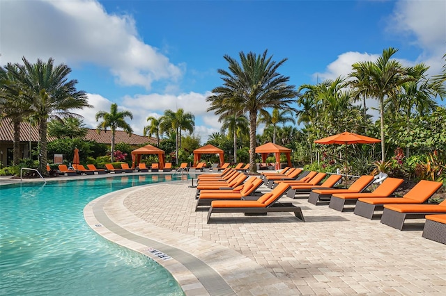 view of pool featuring a gazebo and a patio