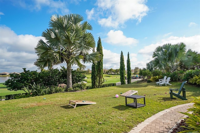 view of home's community featuring a lawn