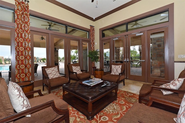 living room with french doors and crown molding